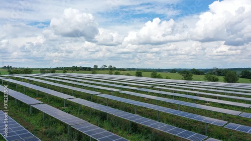 Solar Panel Farm in Countryside (Drone)