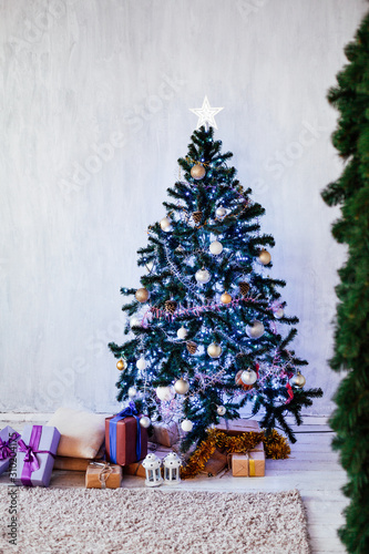 Christmas tree with presents  Garland lights new year winter home decoration