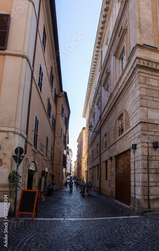 Narrow cobbled alleyway in Rome
