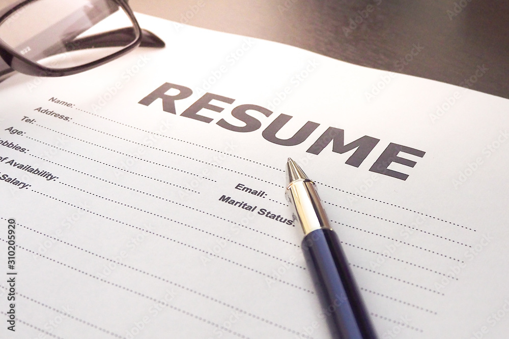 Paper for filling out a resume for job applications and pens