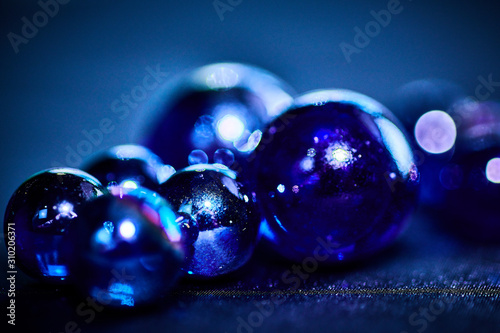 Christmas New Year bright bokeh abstract background of glass balls