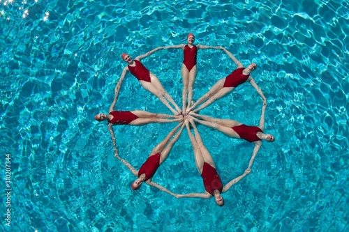 Synchronised Swimmers Forming A Circle