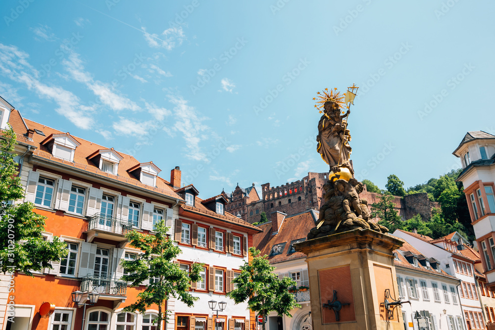 Old town Kornmarkt square and Heidelberg castle in Heidelberg, Germany Old town Kornmarkt square and Heidelberg castle in Heidelberg, Germany