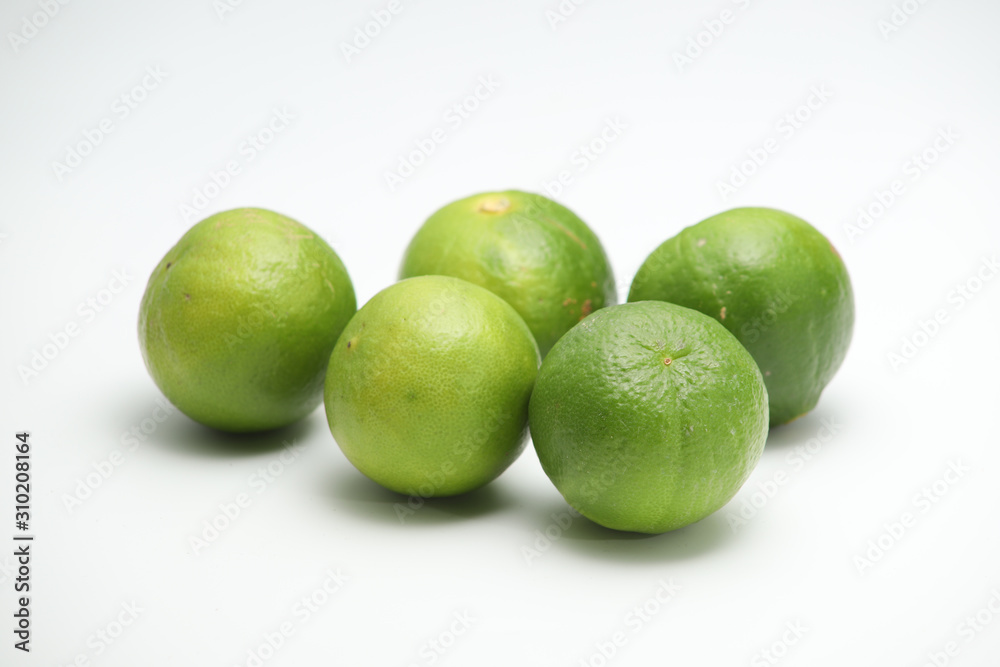 Fresh green lime isolated on white background Fresh green lime isolated on white background