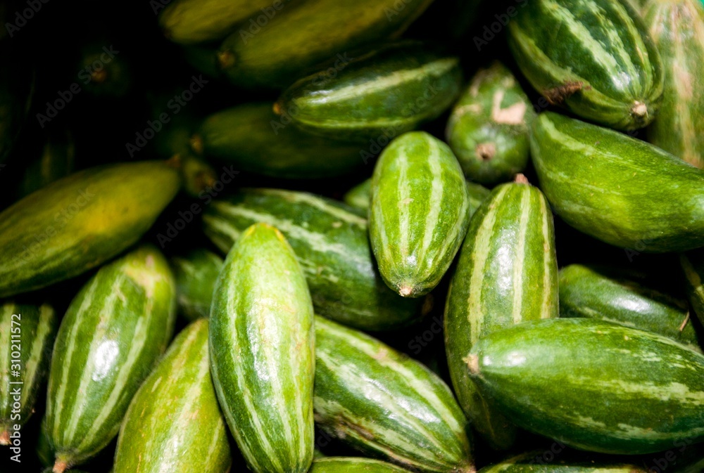Close-up of fresh cucumbers in grocery store Close-up of fresh cucumbers in grocery store