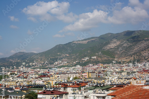 view of the city at the foot of the mountain