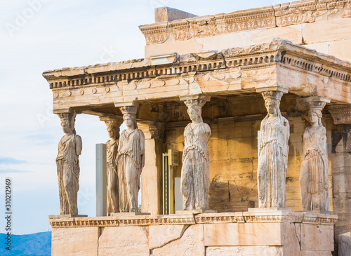 Erechtheion temple in Acropolis of Athens in Greece close up with Caryatids