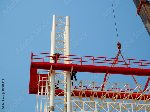 Man working on the Working at height in construction site