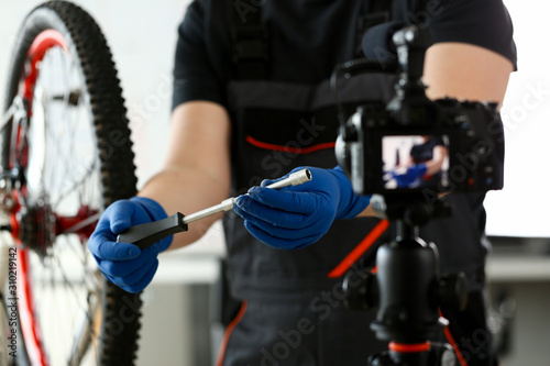 Man Recording Spanner for Bicycle Repair Blog