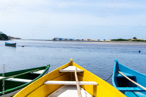 colorful kayaks on the beach