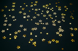 golden stars on a black background