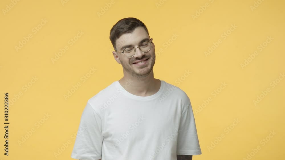 Flattered and pleased, happy young caucasian bearded man, boyfriend receive praises and blushing, feeling slightly modest and shy, smiling cute, hear compliment or nice words, yellow background Flattered and pleased, happy young caucasian bearded man, boyfriend receive praises and blushing, feeling slightly modest and shy, smiling cute, hear compliment or nice words, yellow background
