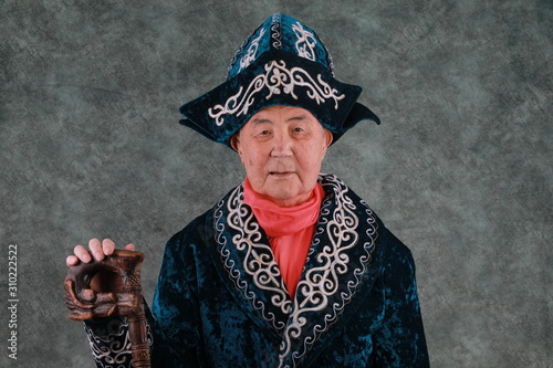 portrait of an old kazakh in national kazakh clothes