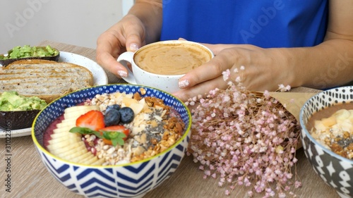 Woman Having Healthy Vegan Breakfast