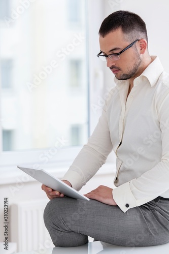 Businessman using tablet computer