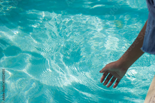Touching the water using swinging hands