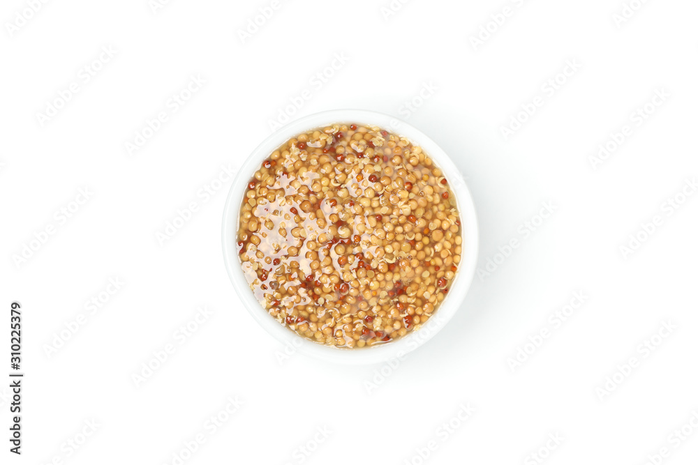 Tasty grain mustard in bowl isolated on white background