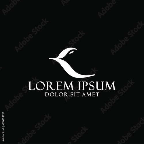 Initial letter K logo template with bird on negative space and leaves gothic symbol in flat design monogram illustration