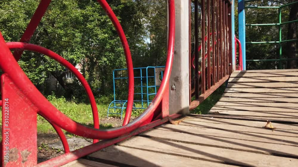 Abandoned playground. Old rusty children’s slides and rides in the autumn forest or park. Abandoned playground. Old rusty children’s slides and rides in the autumn forest or park.
