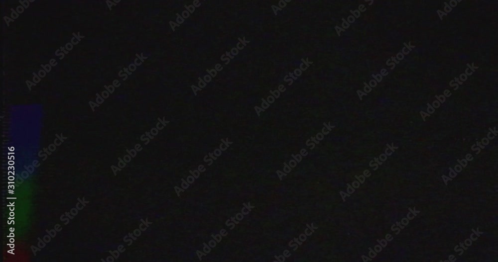 Old VHS Glitches and Static Noise on the black Background. TV Noise Footage, analog signal with bad interference Old VHS Glitches and Static Noise on the black Background. TV Noise Footage, analog signal with bad interference
