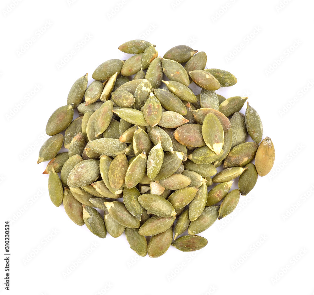 Pumpkin seeds on a white background Pumpkin seeds on a white background