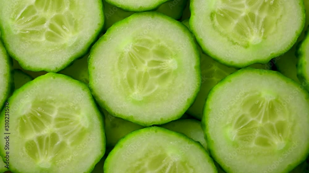 slices of cucumber spin closeup