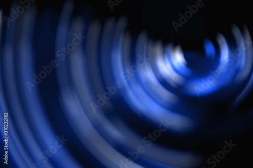 Abstract blue background , blurred circle on the black background