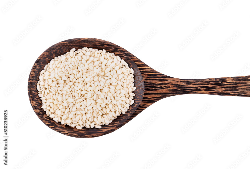 white sesame seeds with wooden spoon on white background white sesame seeds with wooden spoon on white background