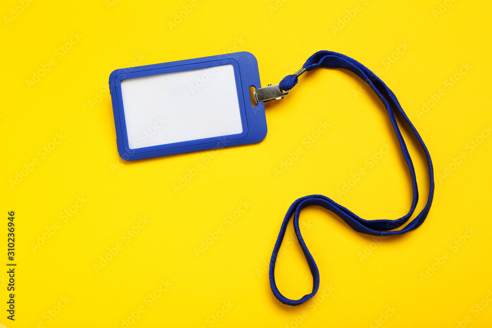 Blank white bagde on yellow background Blank white bagde on yellow background