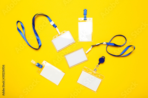 Blank white bagdes on yellow background