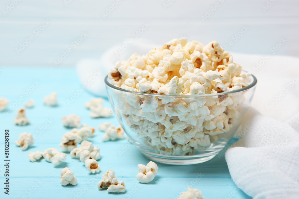 popcorn in a plate on the table popcorn in a plate on the table