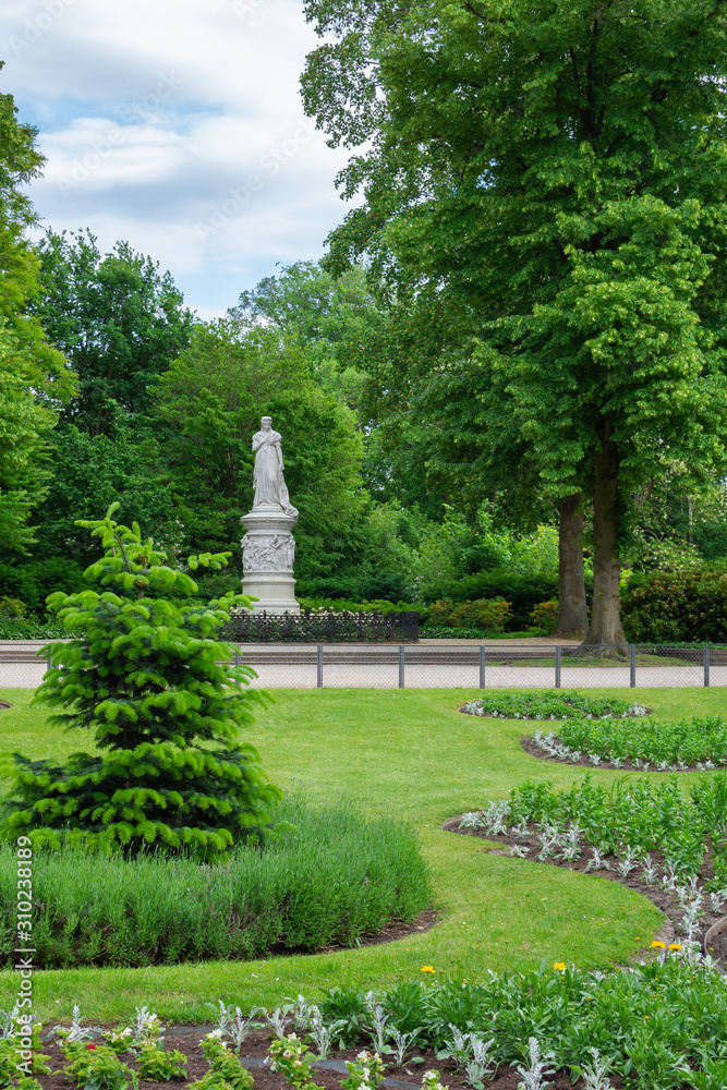 The Tiergarten, walk through the green beautiful park in central Berlin , green lawns and beautiful flowers The Tiergarten, walk through the green beautiful park in central Berlin , green lawns and beautiful flowers