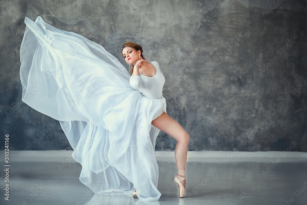 beautiful russian girl dancing in white in the studio beautiful russian girl dancing in white in the studio