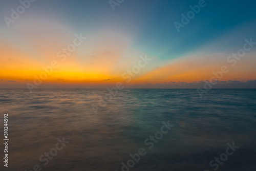 susnet with incredible colors on the ocean  © Joerg