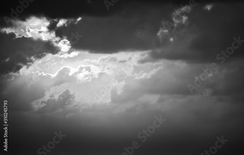 looking into the sky, where the clouds and the sunset are amazing  photo