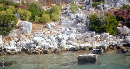 Sunken Lycian city on the Kekova island, Antalya province, Turkey photo