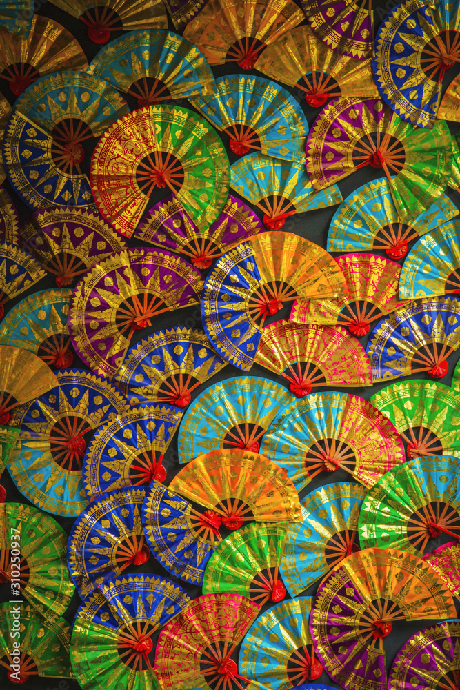 Traditional hand fan on display for photography background