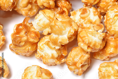 Delicious caramelized popcorn macro junk food photo