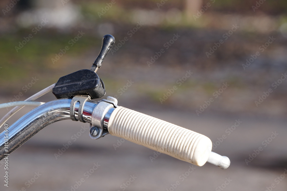Obraz premium part of a Bicycle or handlebar, grips. eco-friendly vehicle, sporty city and people.