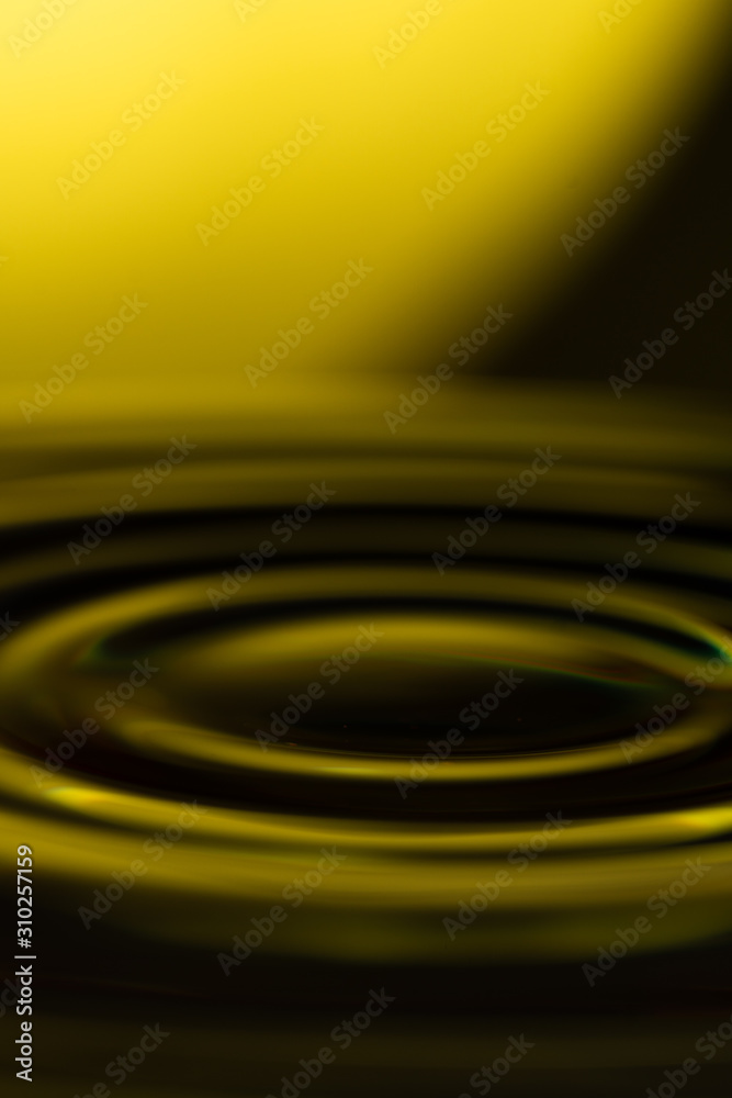 vibration on yellow water on a background of a yellow star
