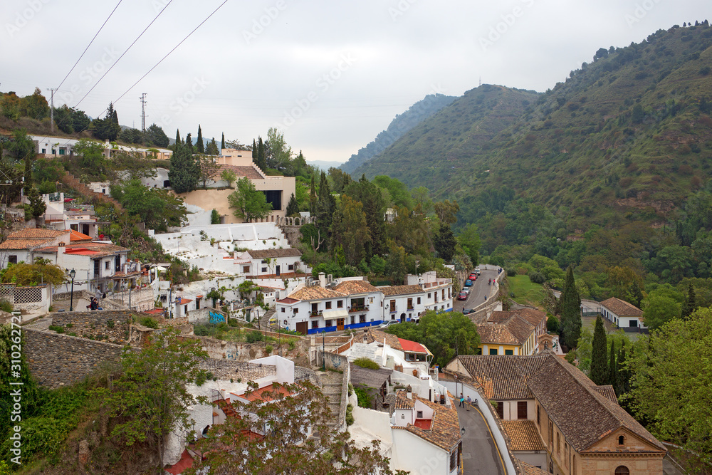 Sacromonte village famous for its houses made in caves at the hill slopes, Granada, Spain