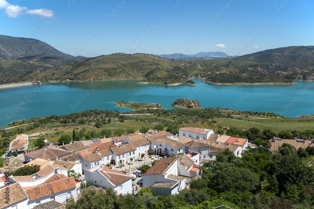 Water reservoir near Zahara de la sierra white village in Andalusia, Spain