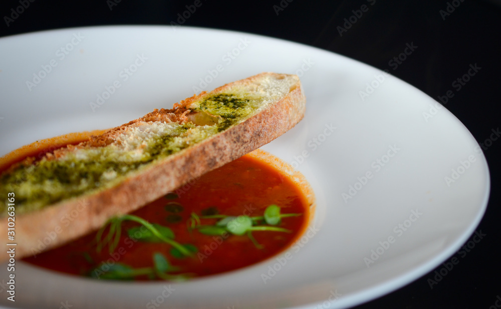 delicious tomatoes soup with toasted home made bread delicious tomatoes soup with toasted home made bread