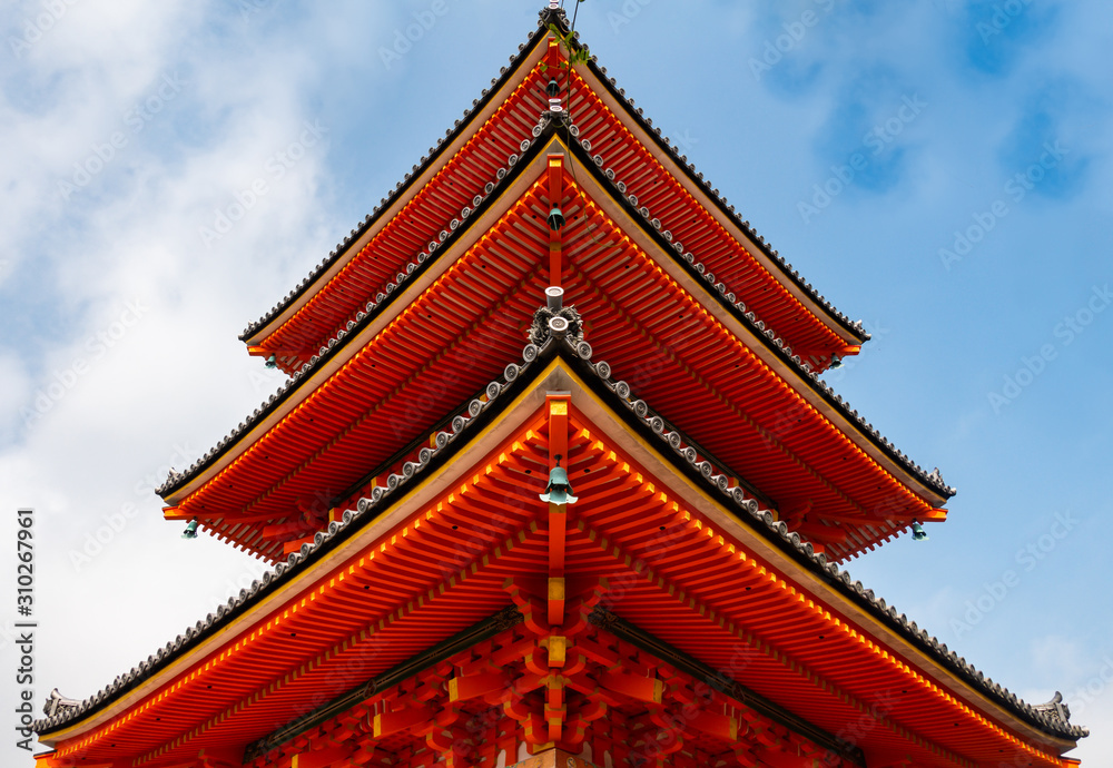 Partial view of the red main gate in the buddhist temple Kiyomizu-dera in Kyoto, Japan