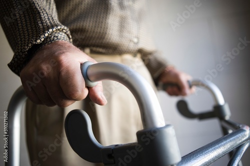 Slika na platnu Man Using Walking Frame