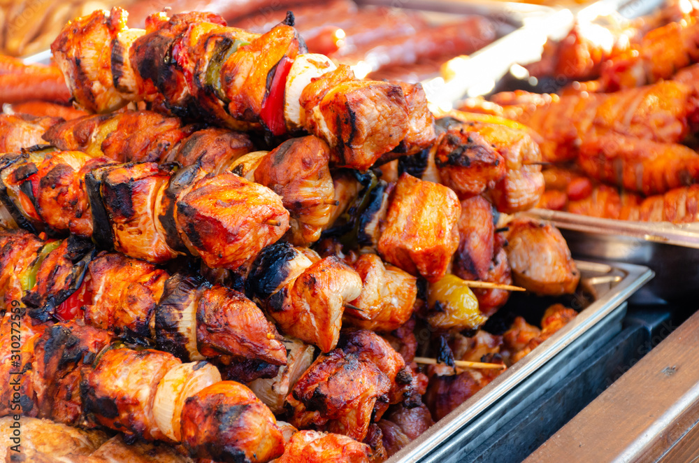 Skewers of grilled meat and vegetables