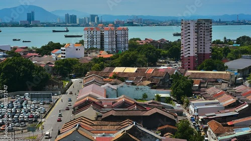 Timelapse of Georgetown, Penang city with ferry movement at background photo