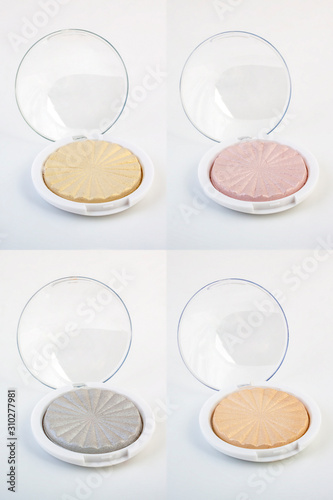 set of Face Cosmetic Makeup Powder highlighter in compact in white Round Plastic Case on White Background