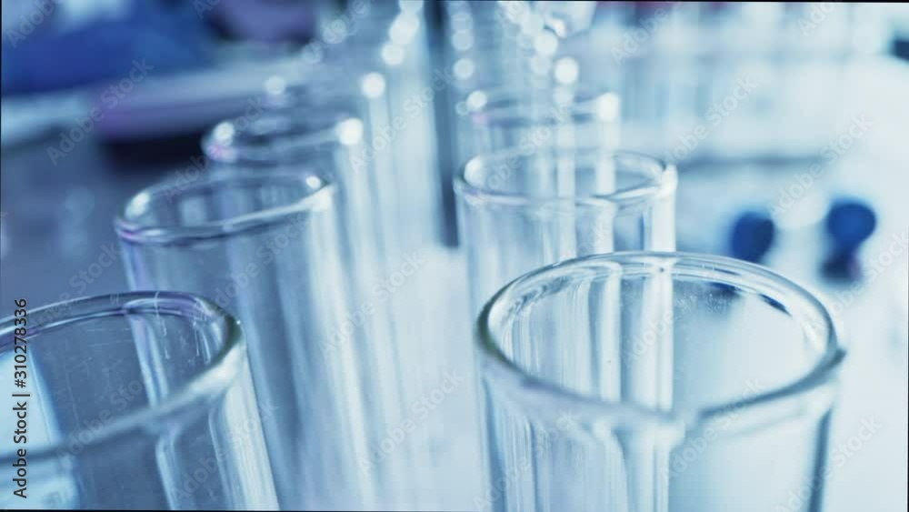 Sample Lab Dripper Pharmaceutics Laboratory: Pipette Dropping Liquid into Test Tubes ...
