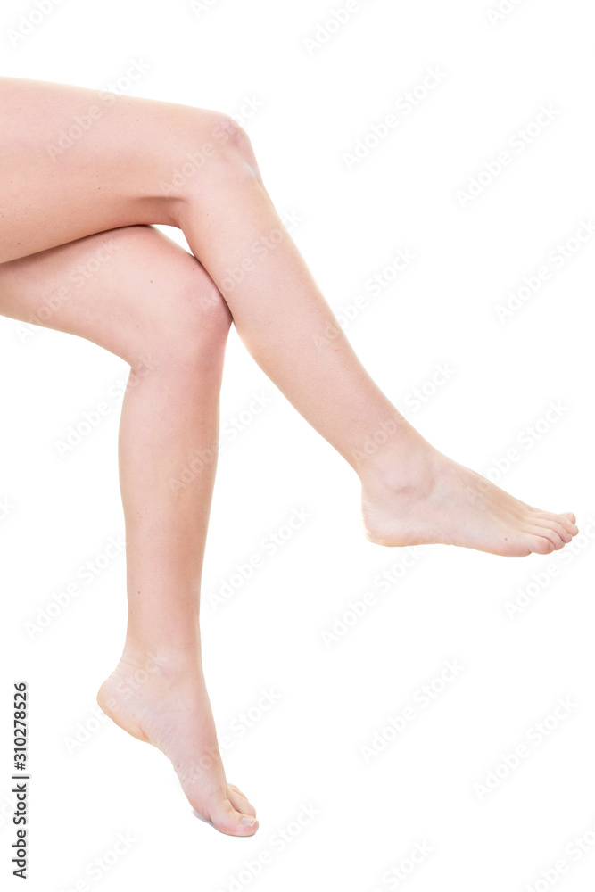 Beautiful long slim woman legs on white background Beautiful long slim woman legs on white background